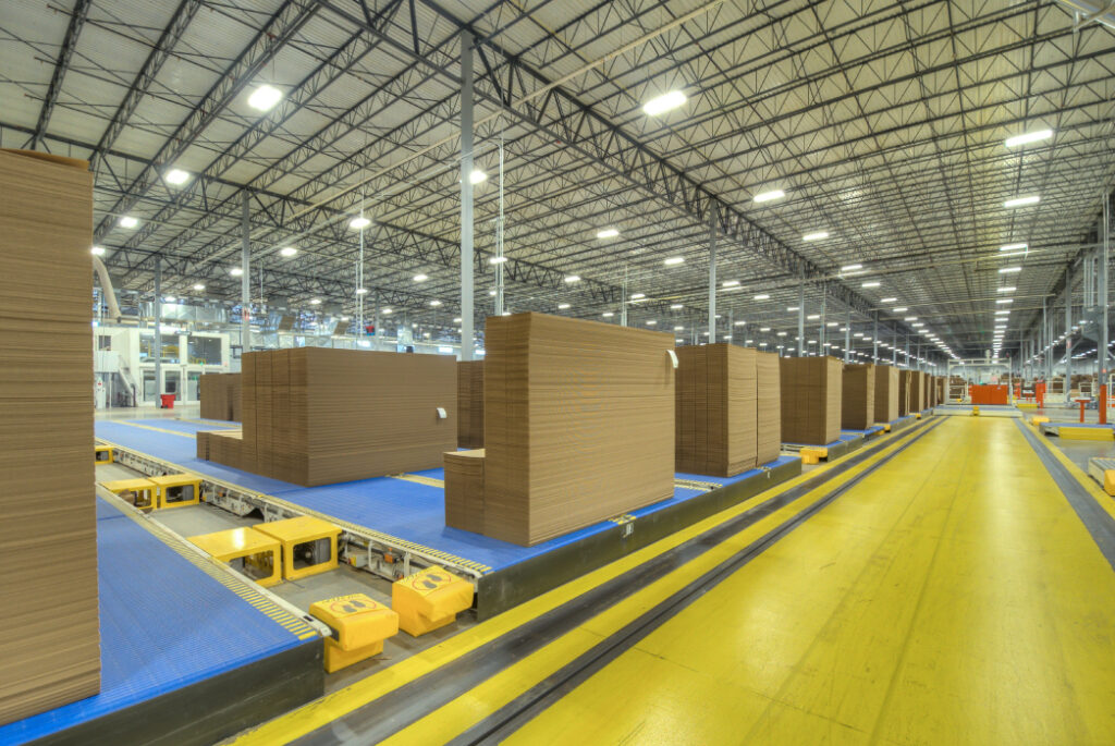 Corrugated sheets on a conveyor at Green Bay Packaging's Tulsa Division.