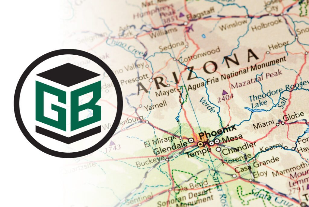 Close-up of a map showing the state of Arizona with cities such as Phoenix, Glendale, Tempe, Mesa, and Chandler labeled. The Green Bay Packaging (GB) logo, featuring a stylized cube with the letters “GB” inside a circle, is prominently displayed on the left side of the image, partially overlapping the map. The map background is slightly faded around the logo area for contrast.